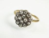 Lot 225 - A late 19th century diamond cluster ring, the...