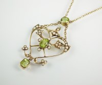 Lot 232 - An early 20th century peridot and seed pearl...