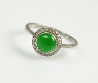 Lot 236 - A cabochon green stone and diamond cluster...