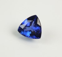 Lot 266 - An unmounted trilliant cut tanzanite, with...