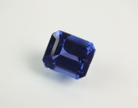 Lot 268 - An unmounted octagon step cut tanzanite, with...