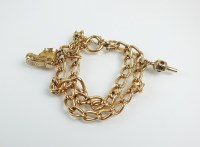 Lot 277 - A 15ct gold double curb link bracelet, with...