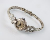 Lot 290 - A Lady's white metal diamond set bracelet...