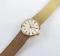 Lot 300 - A Lady's 9ct gold Omega bracelet watch, the...