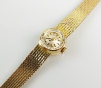 Lot 314 - A Lady's 9ct gold Omega bracelet watch, the...