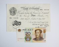 Lot 467 - A Bank of England white five pound note,...