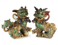 Lot 1 - A very large pair of Chinese sancai glazed foo...