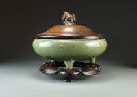 Lot 5 - A Chinese Longquan celadon tripod censer, Ming...
