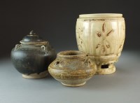 Lot 9 - Three Chinese pottery vessels, Han to Tang...
