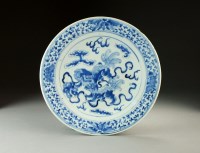 Lot 21 - A Chinese blue and white dish, 19th Century,...