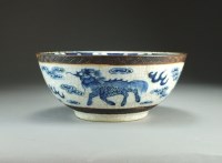 Lot 27 - A Chinese Guan type blue and white bowl,...