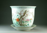 Lot 59 - A Chinese famille rose jardiniere and stand,...