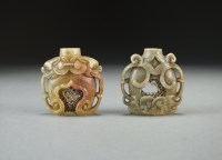 Lot 88 - Two Chinese carved soapstone snuff bottles,...