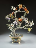 Lot 92 - A Chinese mixed hardstone model of a flowering...