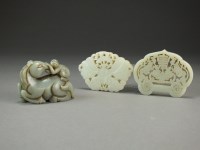 Lot 96 - Two Chinese jade pendants, the first pale...