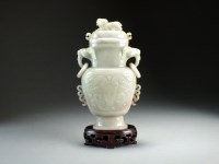 Lot 97 - A Chinese nephrite jade vase and cover,...