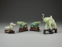 Lot 108 - A pair of jadeite figures of water buffalo on...