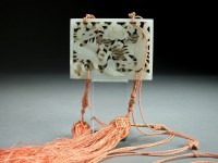 Lot 112 - A Chinese near white jade belt buckle, Ming,...