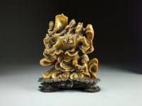 Lot 114 - A Chinese carved soapstone figure group, 19th...
