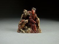 Lot 117 - A Chinese carved soapstone figure of Guanyin,...