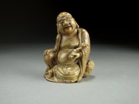 Lot 118 - A Chinese carved soapstone figure of a Buddha,...