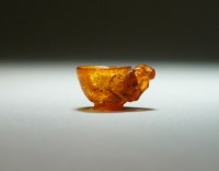 Lot 125 - A Chinese amber miniature libation cup, Qing...
