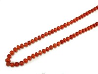 Lot 127 - An coral bead necklace, comprising...