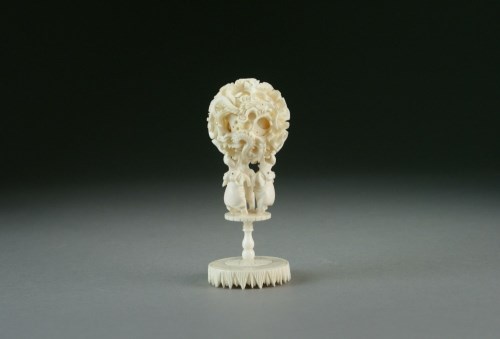 Lot 197 - A Chinese Canton carved ivory puzzle ball on...