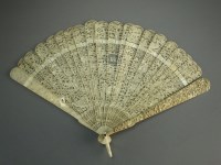 Lot 209 - A Chinese Canton ivory brise fan, 19th Century,...
