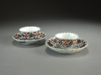 Lot 219 - A pair of Japanese Imari teabowls and saucers,...