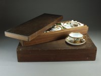 Lot 230 - A cased set of Japanese Kutani teacups and...