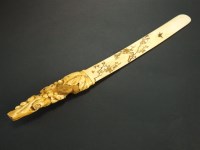 Lot 245 - A Japanese shibayama ivory page turner, Meiji...