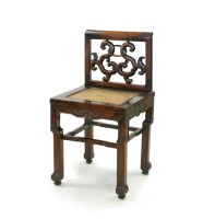 Lot 285 - A Chinese hardwood child's chair, 19th Century,...