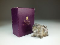Lot 7 - An Asprey & Co silver model of a Pekingese dog,...