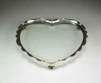 Lot 13 - A silver mounted heart shaped glass platter,...