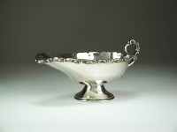 Lot 20 - A Mexican Sterling silver sauce boat, of...