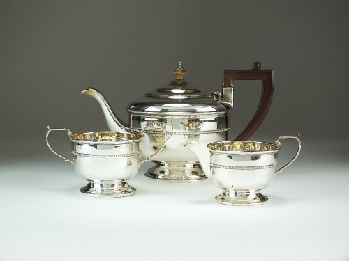 Lot 29 - A three piece silver tea service, Selfridge &...