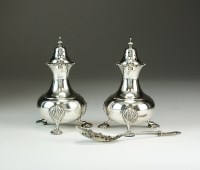 Lot 54 - A pair of silver pepperettes, Horace Woodward...