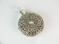 Lot 60 - A Victorian silver cased glass scent bottle,...