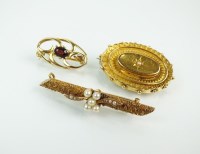 Lot 130 - A seed pearl set bar brooch, the reverse with '...