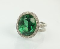 Lot 146 - A green stone and diamond dress ring, designed...