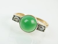 Lot 150 - A green stone and diamond cluster ring,...