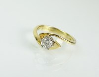 Lot 153 - An 18ct gold single stone diamond ring, the...