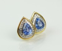 Lot 173 - A pair of sapphire and diamond stud earrings,...