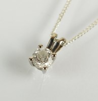 Lot 175 - A single stone diamond pendant, the brilliant...