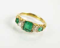 Lot 186 - A five stone emerald and diamond ring,...