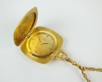 Lot 238 - An 18ct gold Omega De Ville textured pendant...