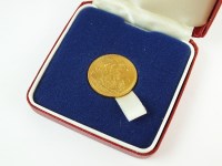 Lot 619 - An Elizabeth II sovereign, dated 1979, within...
