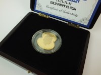 Lot 664 - A Jersey £5 gold proof poppy coin, dated 2011,...