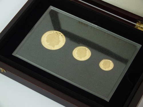 Lot 667 - A 2011 Jersey gold three coin sovereign set,...